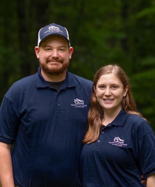 A man and a woman standing next to each other